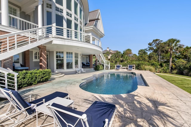 view of pool with a patio area