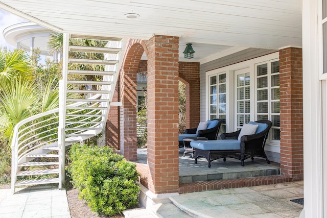 view of patio featuring a porch