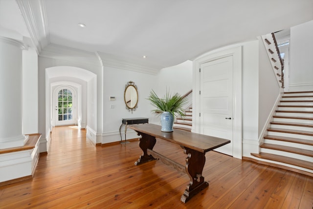 office space featuring ornamental molding and wood-type flooring