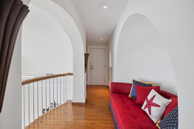 corridor featuring wood-type flooring