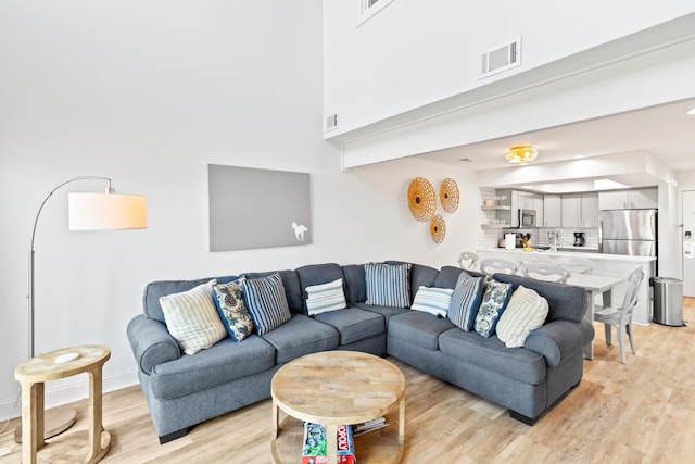 living room featuring light hardwood / wood-style flooring