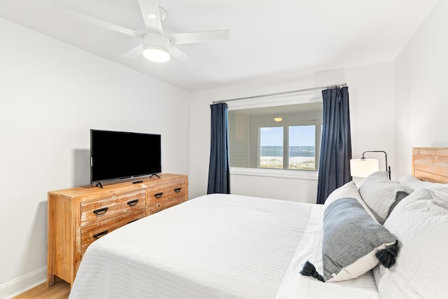 bedroom featuring ceiling fan and light wood-type flooring