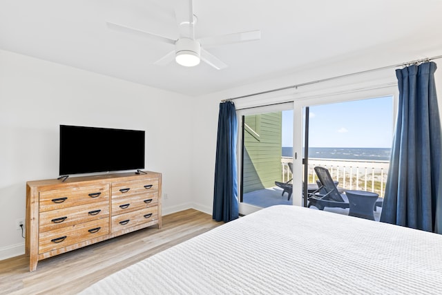 bedroom featuring access to exterior, ceiling fan, and wood-type flooring