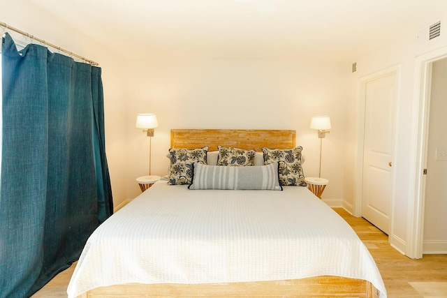 bedroom featuring light hardwood / wood-style floors