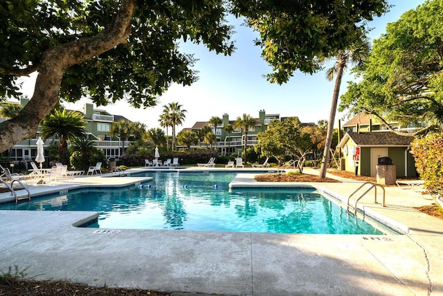 view of swimming pool featuring a patio area