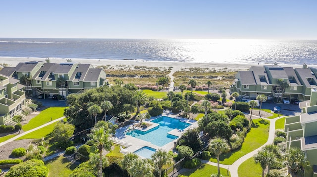 aerial view with a view of the beach and a water view