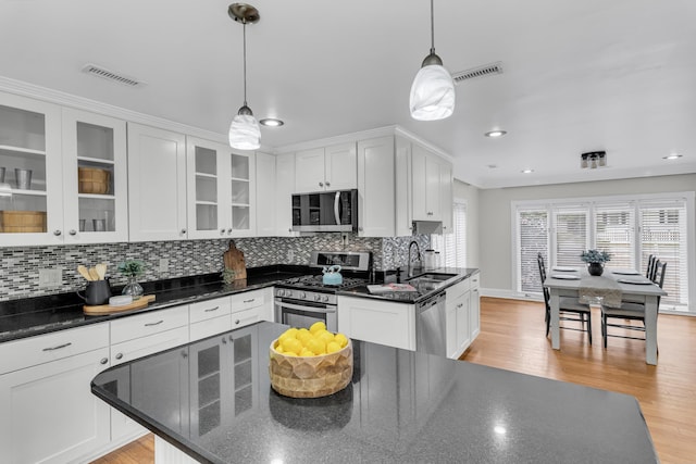 428 Carn St, Walterboro, SC 29488 - kitchen with a sink, white cabinets, stainless steel appliances, and visible vents