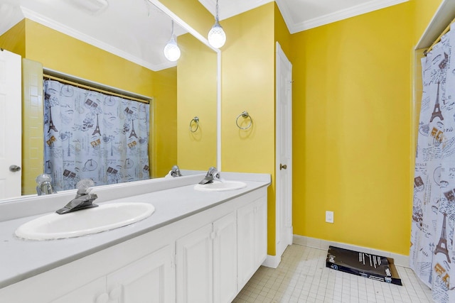 428 Carn St, Walterboro, SC 29488 - bathroom with tile patterned floors, ornamental molding, double vanity, and a sink