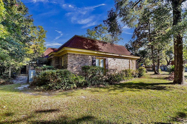 428 Carn St, Walterboro, SC 29488 - view of property exterior with a yard and brick siding