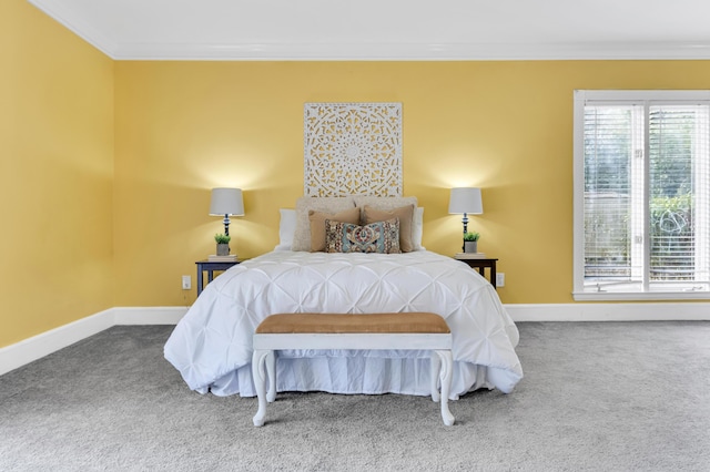 428 Carn St, Walterboro, SC 29488 - carpeted bedroom featuring baseboards, ornamental molding, and multiple windows