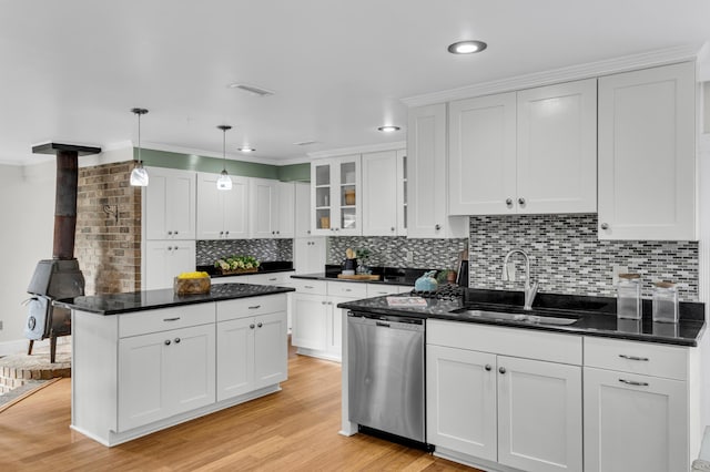 428 Carn St, Walterboro, SC 29488 - kitchen with a sink, visible vents, backsplash, white cabinetry, and dishwasher