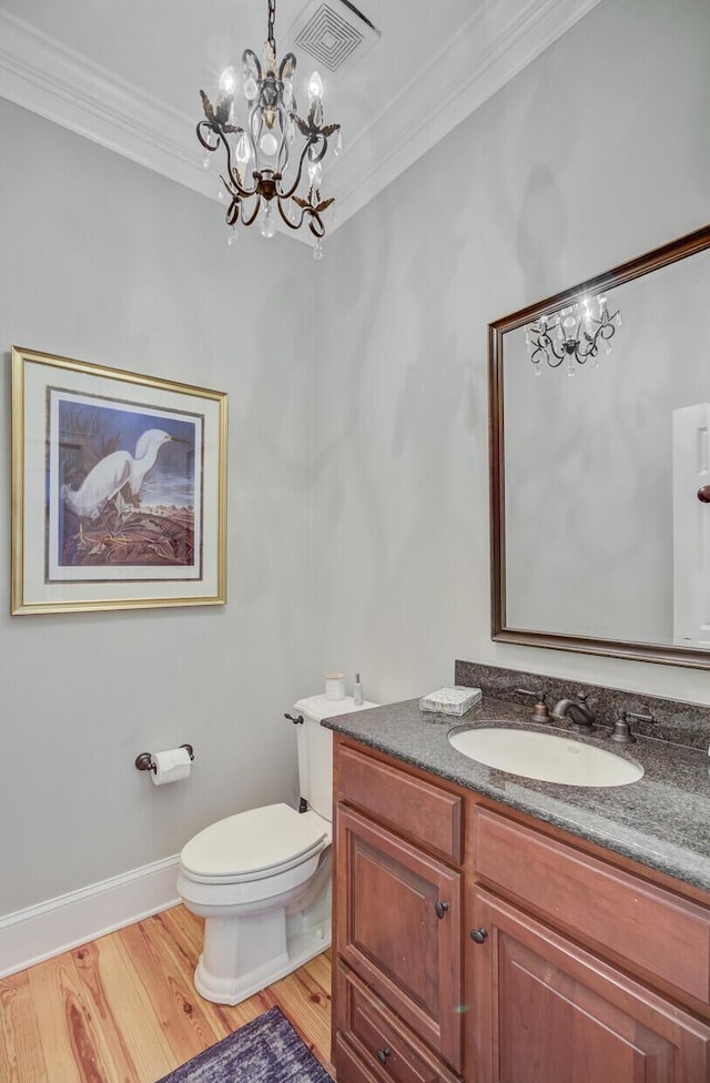 750 Navigators Run, Mount Pleasant, SC 29464 - bathroom with a chandelier, crown molding, vanity, and wood finished floors