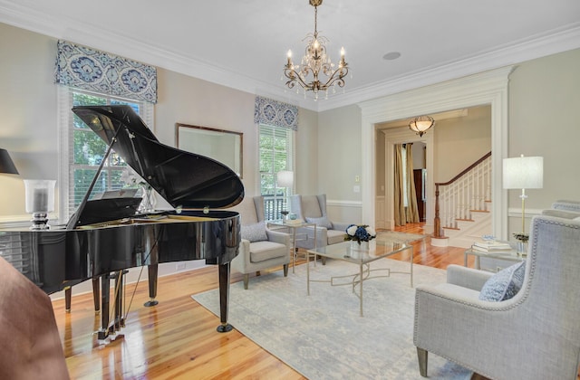 750 Navigators Run, Mount Pleasant, SC 29464 - living area featuring stairs, a chandelier, wood finished floors, and ornamental molding