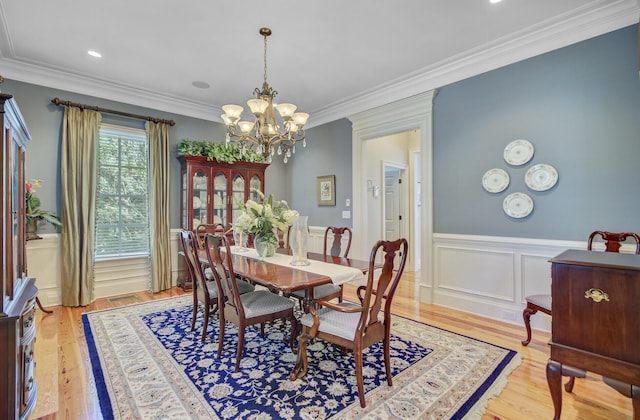 750 Navigators Run, Mount Pleasant, SC 29464 - dining room with a chandelier, a wainscoted wall, light wood-style floors, and ornamental molding
