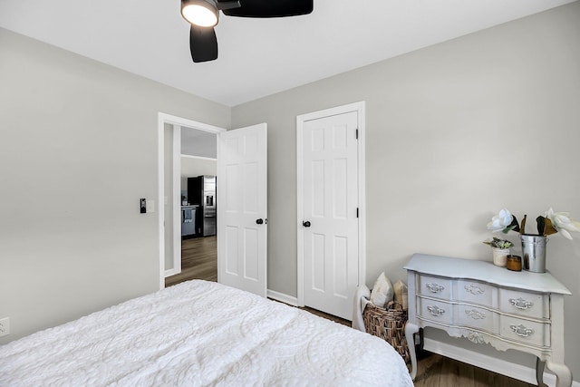 209 Pineview Dr, Goose Creek, SC 29445 - bedroom with wood finished floors, baseboards, a ceiling fan, and stainless steel fridge