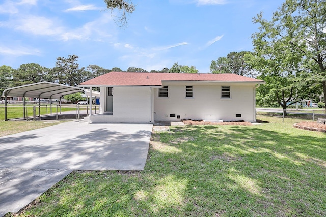 209 Pineview Dr, Goose Creek, SC 29445 - rear view of house with concrete driveway and a detached carport