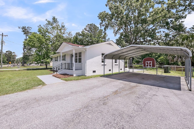 209 Pineview Dr, Goose Creek, SC 29445 - view of front of home with driveway, a carport, brick siding, crawl space, and a porch