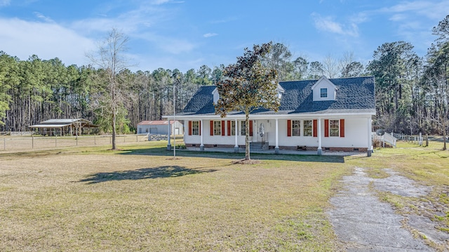 view of front facade featuring a front yard, fence, and crawl space