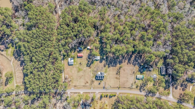 aerial view featuring a view of trees