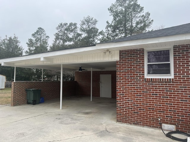 view of car parking featuring ceiling fan and a carport