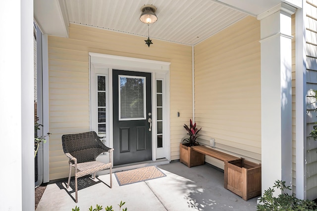 doorway to property with a porch