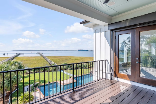 balcony featuring a water view