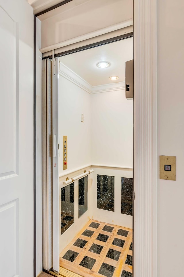 bathroom featuring crown molding