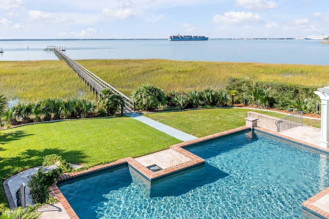 view of pool featuring a water view and a yard