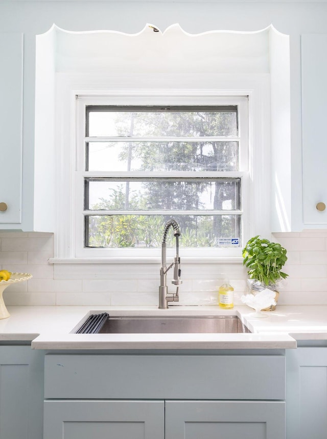5065 Durant Ave, North Charleston, SC 29405 - kitchen featuring decorative backsplash and light countertops