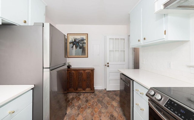 5065 Durant Ave, North Charleston, SC 29405 - kitchen featuring appliances with stainless steel finishes, light countertops, white cabinetry, and stone finish flooring