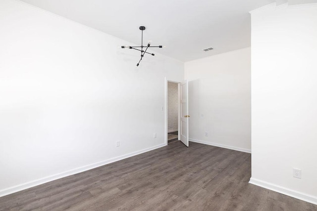 5065 Durant Ave, North Charleston, SC 29405 - spare room featuring a chandelier and dark wood-style flooring