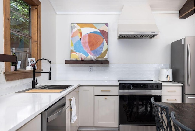 5065 Durant Ave, North Charleston, SC 29405 - kitchen with stainless steel appliances, premium range hood, decorative backsplash, open shelves, and light countertops