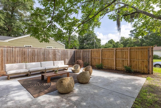 5065 Durant Ave, North Charleston, SC 29405 - fenced backyard with outdoor lounge area and a patio area