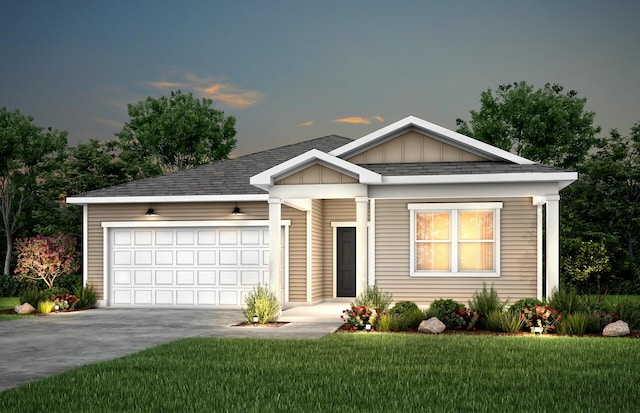 view of front of house featuring driveway, a front lawn, board and batten siding, an attached garage, and a shingled roof