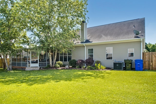 6159 Fieldstone Cir, Charleston, SC 29414 - rear view of property with a sunroom and a chimney