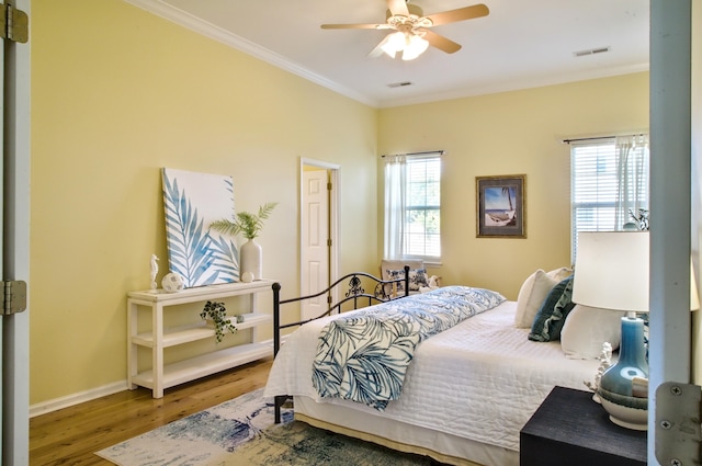 6159 Fieldstone Cir, Charleston, SC 29414 - bedroom with multiple windows, wood finished floors, ornamental molding, and ceiling fan