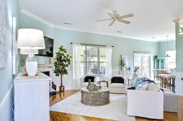 6159 Fieldstone Cir, Charleston, SC 29414 - living room with a ceiling fan, light wood-style flooring, and crown molding