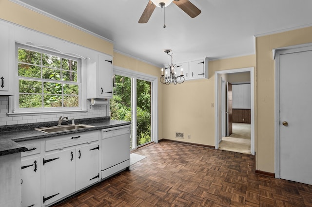1019 Pinon Rd, North Augusta, SC 29841 - kitchen featuring dishwasher, dark countertops, decorative backsplash, white cabinets, and ornamental molding