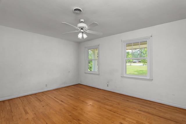 1019 Pinon Rd, North Augusta, SC 29841 - empty room with healthy amount of natural light, light wood-style flooring, and ceiling fan