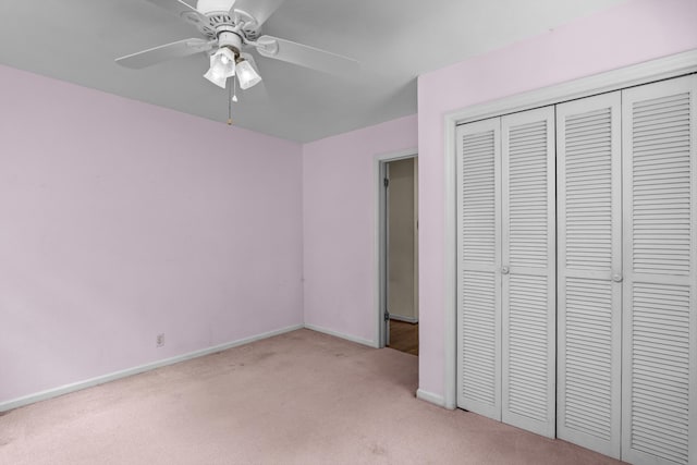 1019 Pinon Rd, North Augusta, SC 29841 - unfurnished bedroom featuring light carpet, a closet, and a ceiling fan