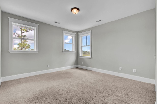 spare room with carpet flooring