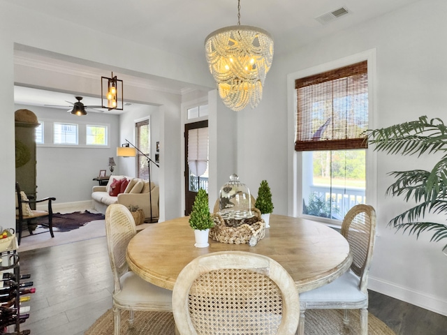 3381 Stockdale St, Mount Pleasant, SC 29466 - dining room with dark wood finished floors, a chandelier, baseboards, and ceiling fan