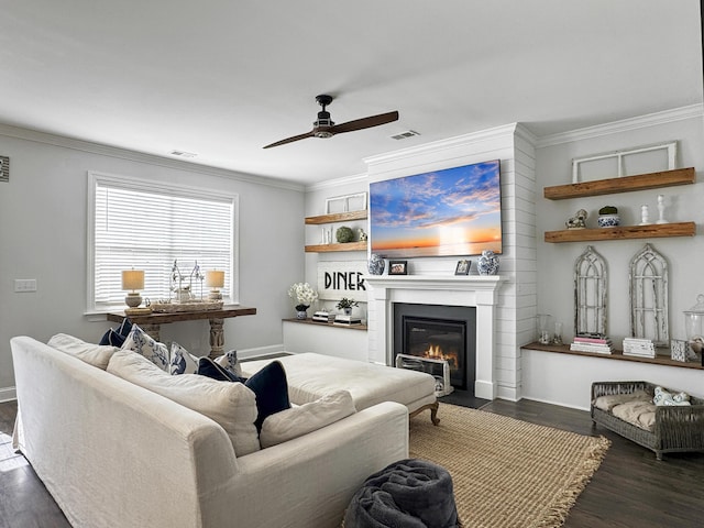 3381 Stockdale St, Mount Pleasant, SC 29466 - living room with ceiling fan, crown molding, wood finished floors, a fireplace with flush hearth, and baseboards