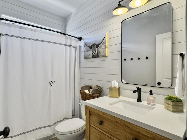 3381 Stockdale St, Mount Pleasant, SC 29466 - bathroom featuring wood walls, toilet, vanity, and a shower with shower curtain