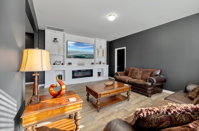 living room featuring light wood-type flooring