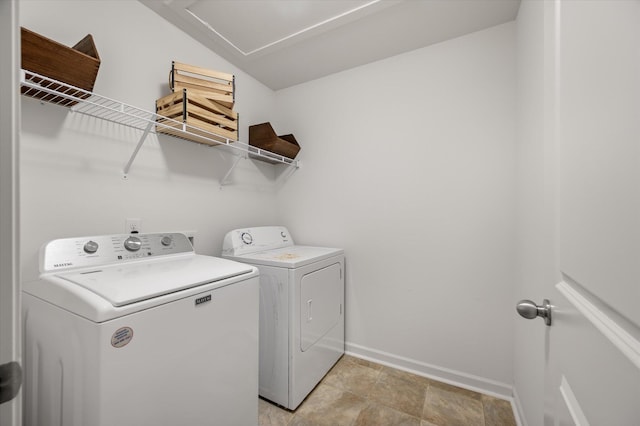 washroom with separate washer and dryer