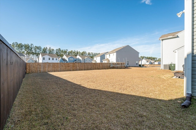 view of yard featuring central AC