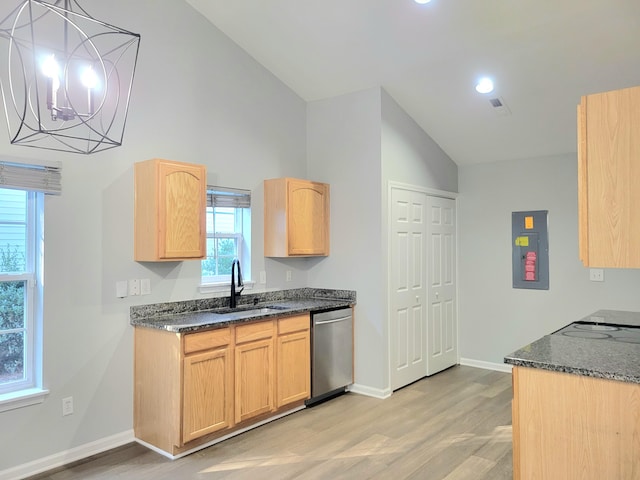 kitchen featuring dishwasher, sink, light hardwood / wood-style flooring, light brown cabinetry, and a chandelier