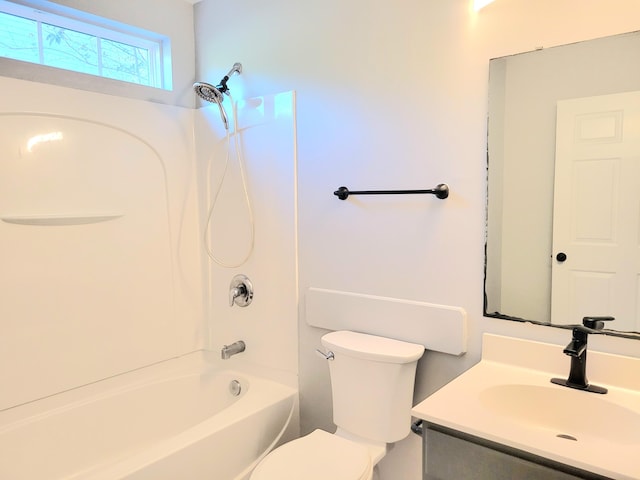 full bathroom featuring shower / washtub combination, vanity, and toilet