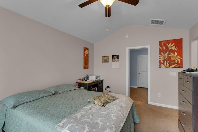 carpeted bedroom featuring ceiling fan and vaulted ceiling